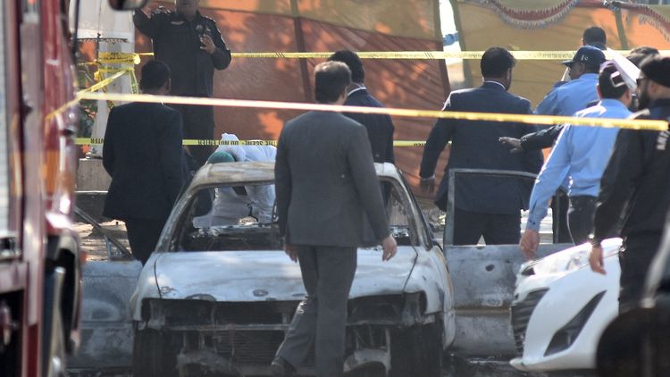 Suicide bomber targets Islamabad court, killing 12 people and wounding 27, minister says