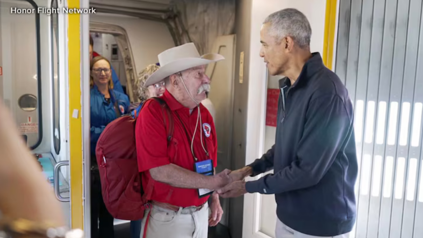 Obama surprises veterans on flight to DC with special salute