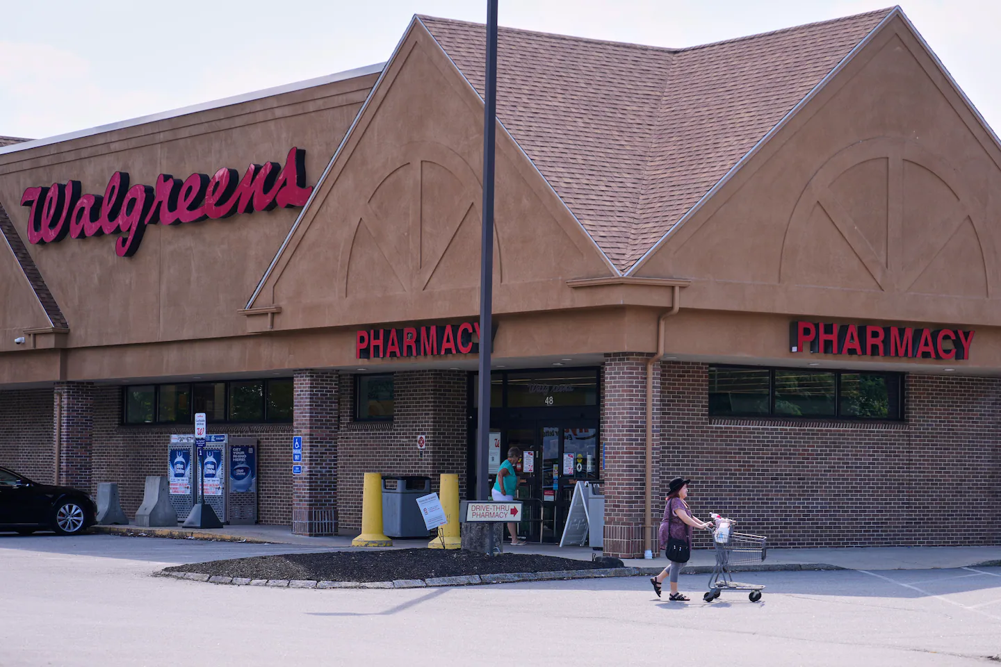 Walgreens cuts pay for hourly store workers after $10 billion buyout