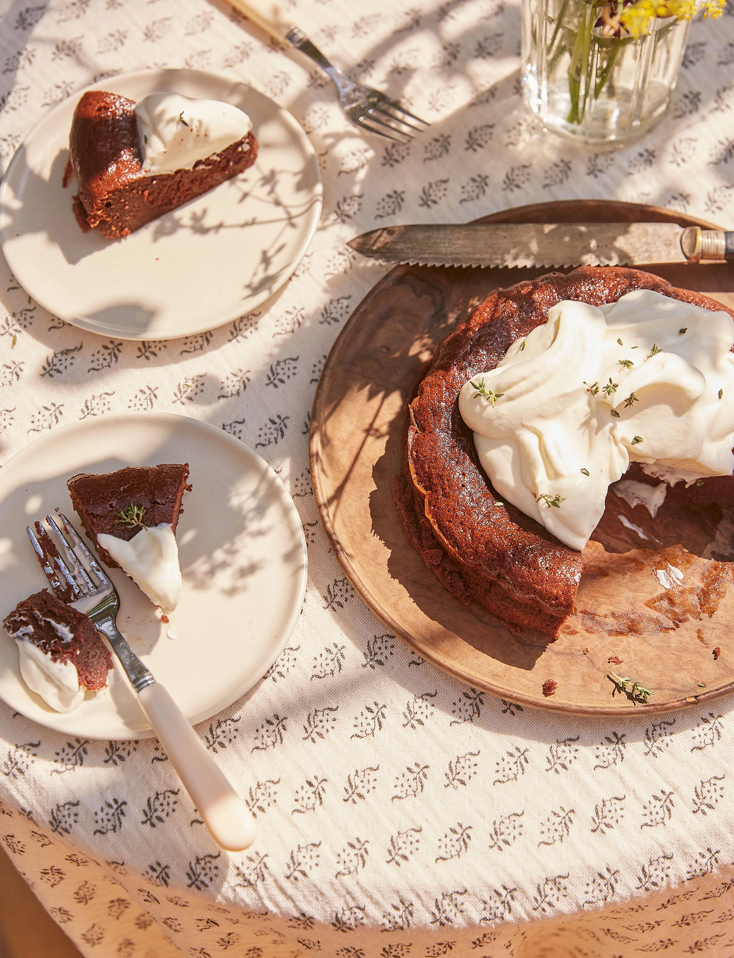 Dark chocolate fondant with fleur de sel and thyme-infused whipped cream