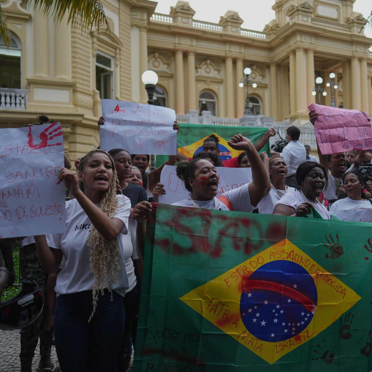 Protests after police raid leaves at least 121 dead in two Rio slums