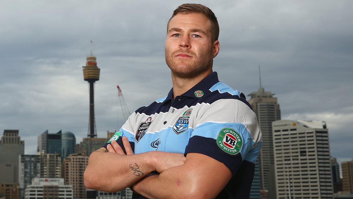 Footy star Trent Merrin hits back after police raided his home and arrested him for allegedly stealing $140,000 from his own teammate