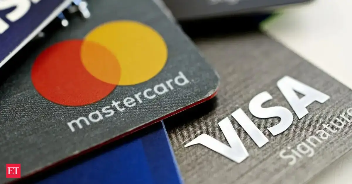 Visa and Mastercard near settlement with merchants, would lower fees: Report