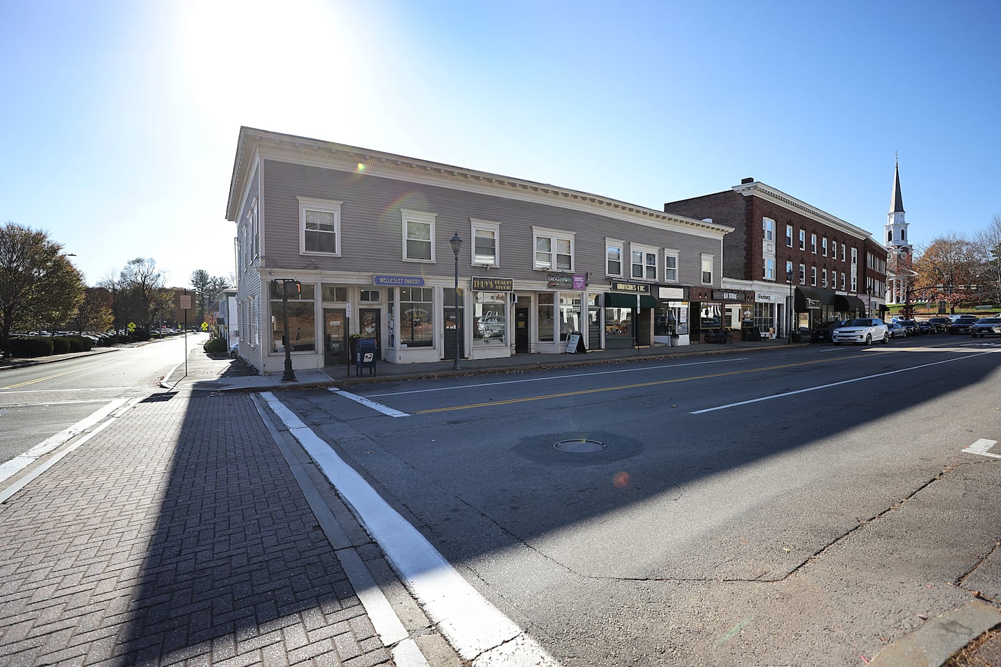 Quincy firm buys prominent stretch of Wellesley Square buildings