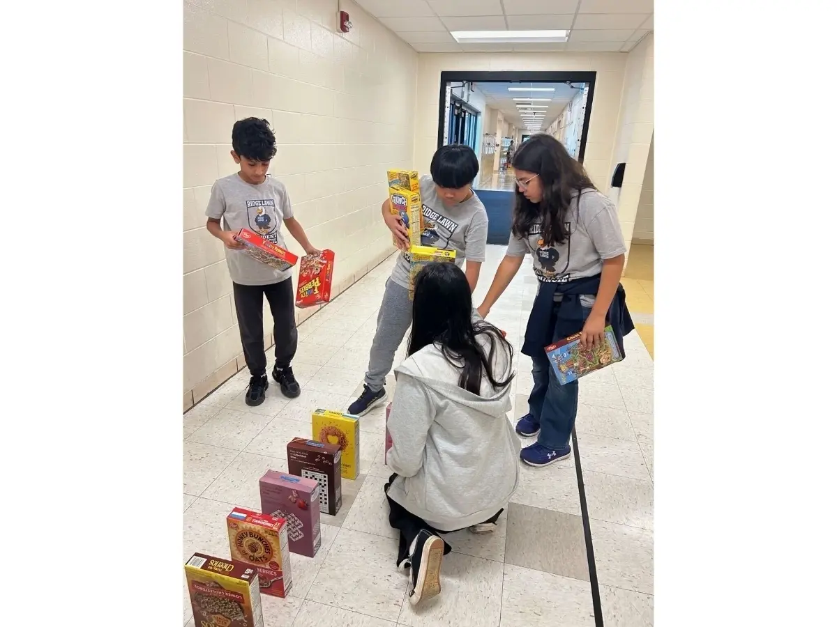 Donation Dominos: Ridge Lawn School Giving 1,000+ Cereal Boxes To Local Food Pantry