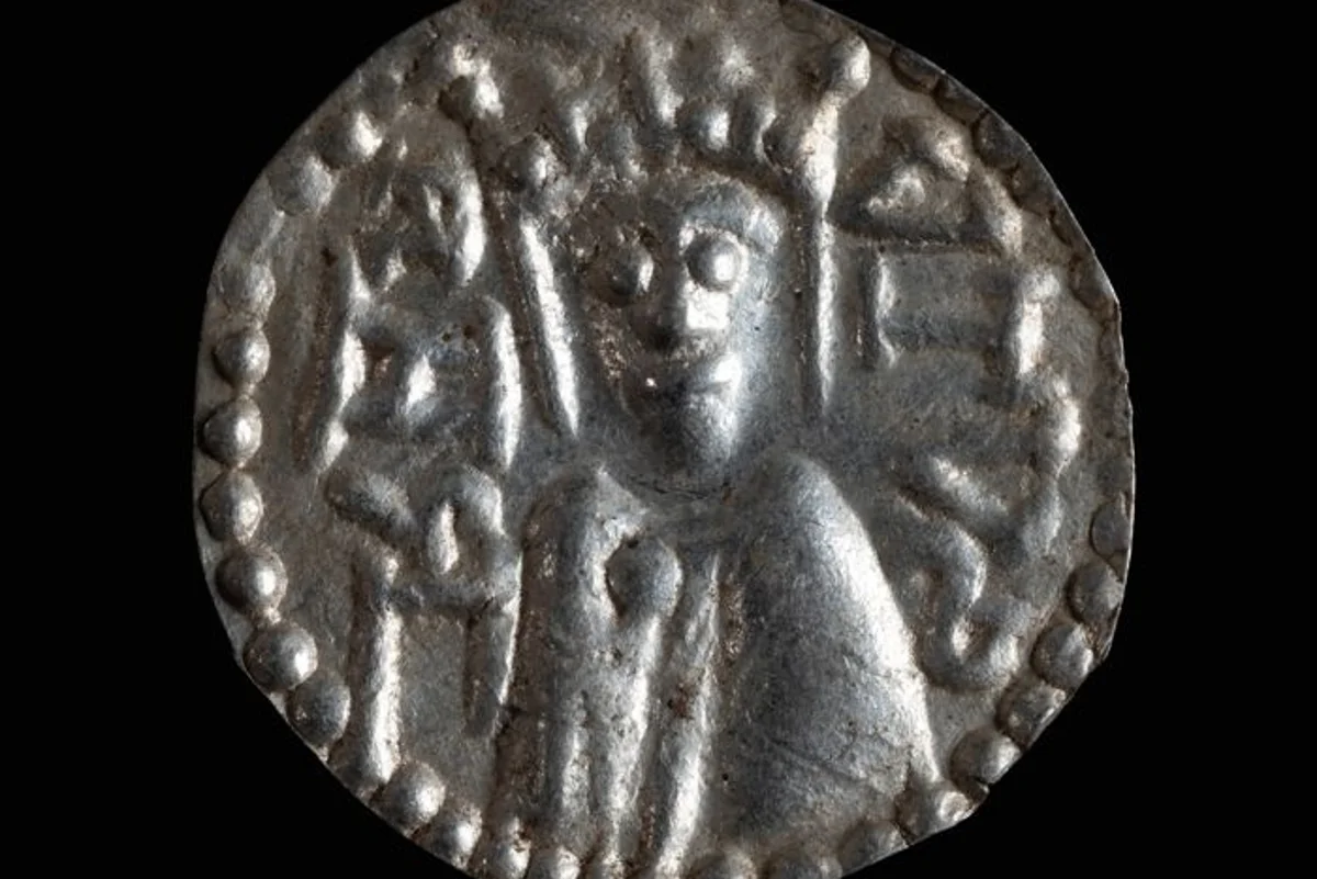 Fisherman discovers medieval cauldron of jewellery and coins